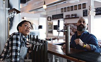 Bar staff in pub