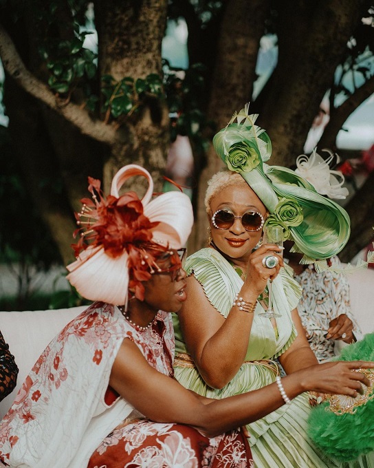 two ladies attending a Nigerian wedding
