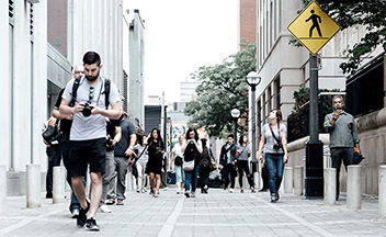 Pedestrians walking in a city