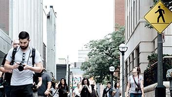 Pedestrians walking in a city