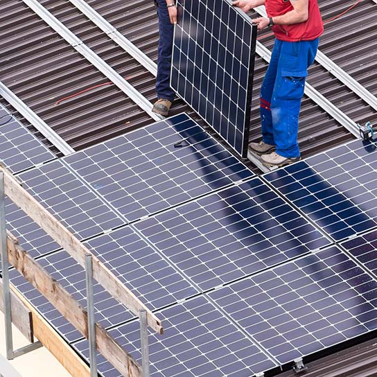 Installation of solar panels on roof