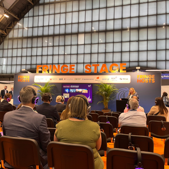 Photo from BIBA 2025 of Adele delivering a fringe session on fraud