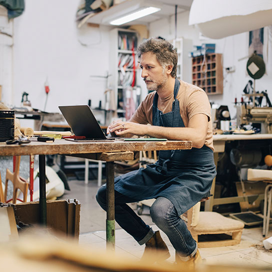 Man at desk with laptop