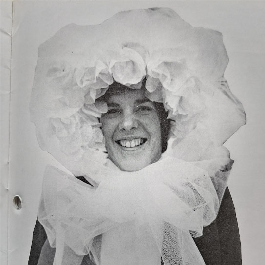 Woman in the Easter bonnet parade.