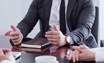 Close up of hands in a meeting