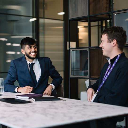 Two men having a meeting in RSA London office