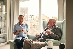 Apprenticeship levy carer with elderly man
