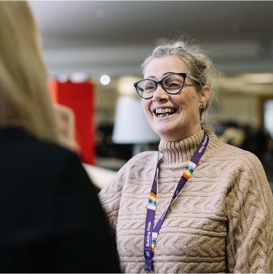 A woman smiling