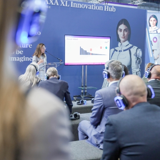 Photo of RSA colleagues at AIRMIC 2025, hosting a seminar on our rebrand to Intact Insurance