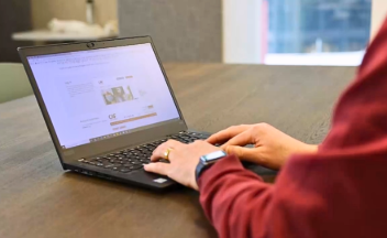 RSA employee on laptop