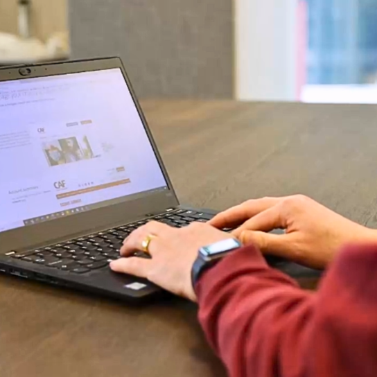 RSA employee on laptop