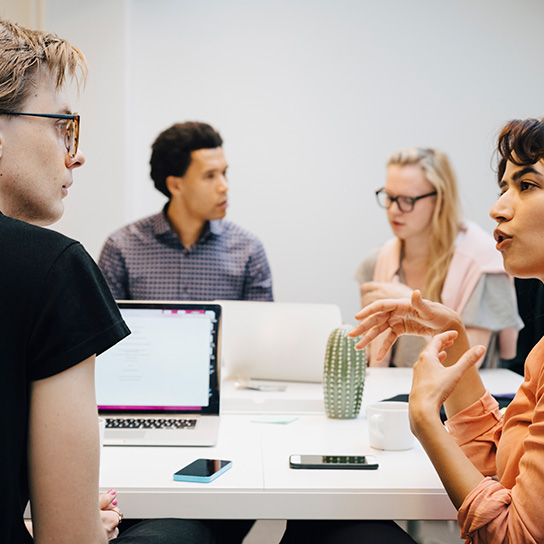 Young people interacting in an office