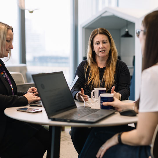 Women talking in RSA London office