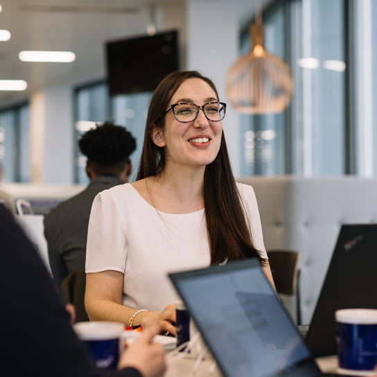 Woman smiling in RSA London office