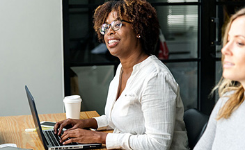 Woman on a laptop in an office