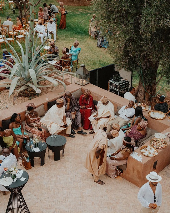 Migerian wedding guests in the garden