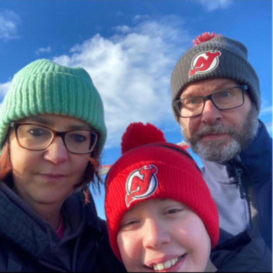 Photo of RSA staff member, Ian Clegg, and his family