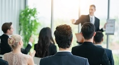 Man leading a training course