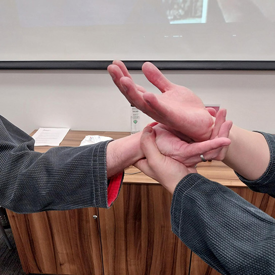 A wrist grip demonstration during a self defence class.