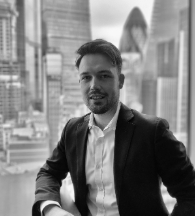 Michael Gregory head shot in black and white.