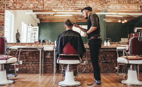 barber and customer in hair salon