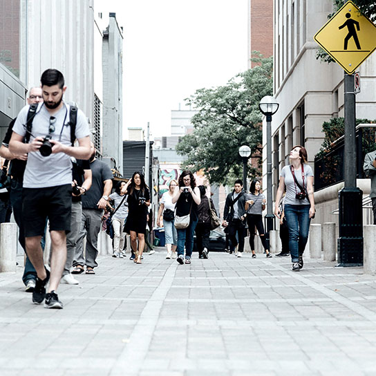 Pedestrians walking in a city